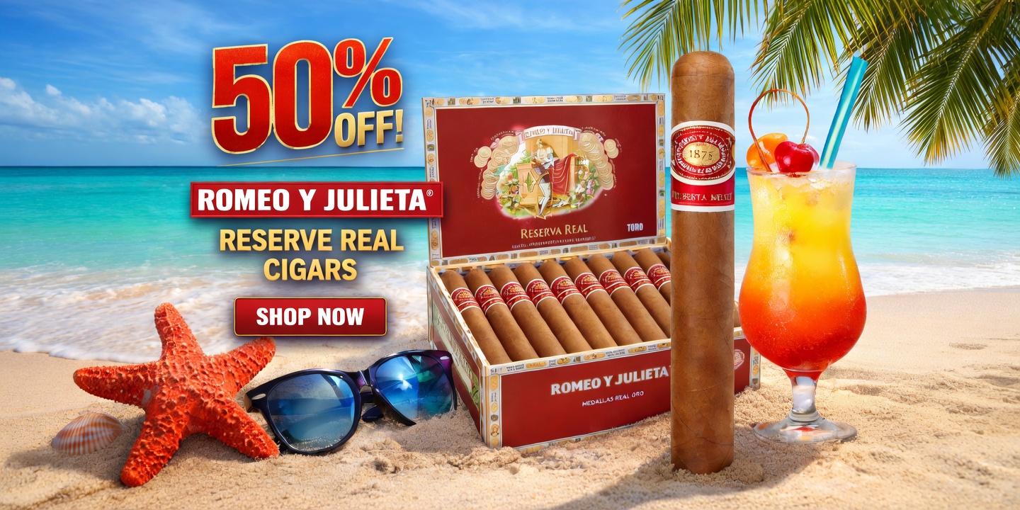Cigars and tropical drink displayed on sunny beach
.